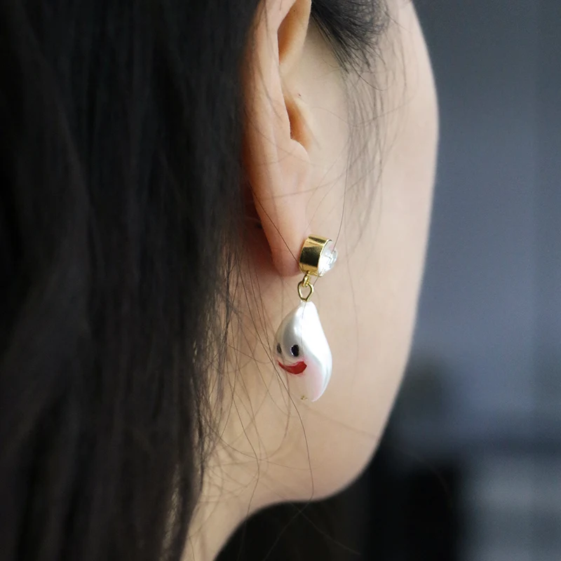 A Faux Baroque Pearl Smile Face Earrings